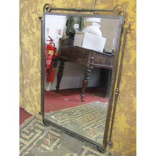 1313 - A contemporary wall mirror with bevelled edge plate within a steel frame, 106cm high x 73cm wide