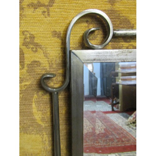 1313 - A contemporary wall mirror with bevelled edge plate within a steel frame, 106cm high x 73cm wide