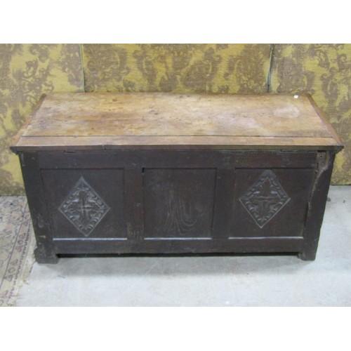 1329 - An antique oak coffer with hinged lid and panelled frame, 46cm high x 100cm x 43cm