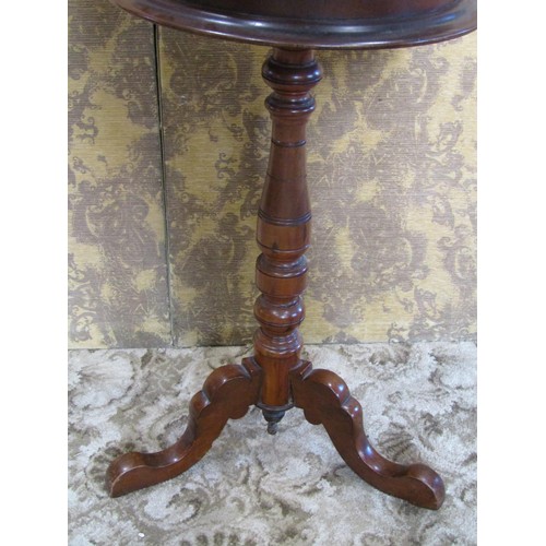 1239 - A Victorian mahogany shaving stand with adjustable circular bevelled edge mirror plate over a box co... 