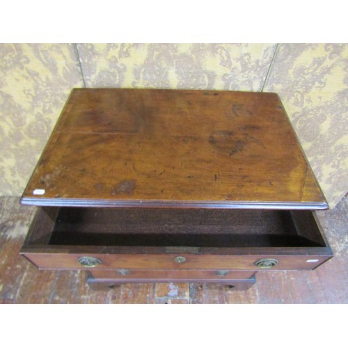 1347 - A small Georgian mahogany and oak lined chest of four drawers on bracket supports, 77cm wide