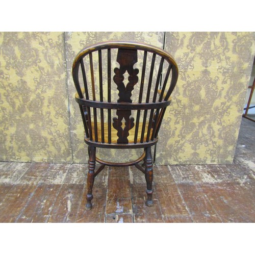 1349 - A pair of Georgian Windsor elbow chairs in ash and elm woods with crinoline stretchers