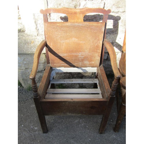 1351 - A Georgian oak countrymade elbow chair with box seat, further example in ash with vase shaped splat ... 