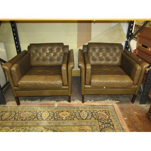 1352 - A pair of 20th century German green leather upholstered squared tub chairs in the Art Deco style, 70... 