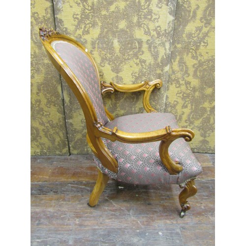 1357 - A Victorian drawing room chair in pale walnut with scrolled arms and cabriole supports (re-upholster... 