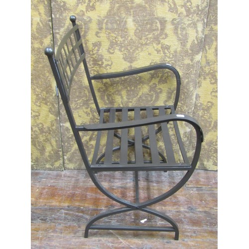 1359 - A contemporary steel X framed elbow chair