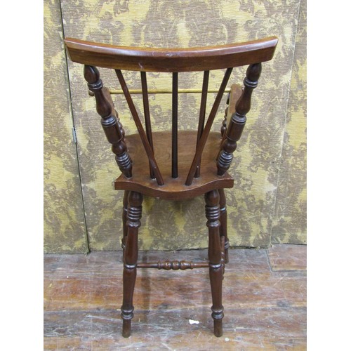 1366 - A 19th century mahogany child's high chair with stick back, turned supports, complete with step