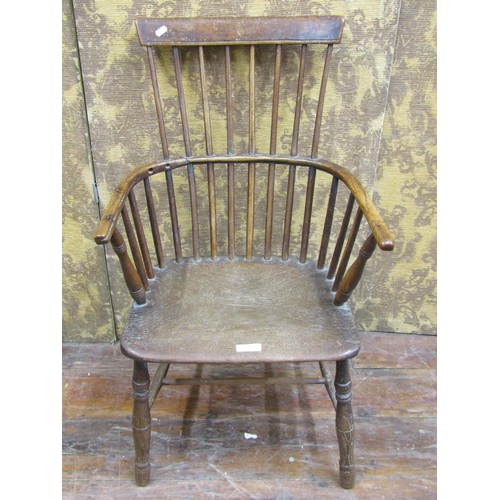 1368 - An early Georgian Windsor stick back chair in ash wood