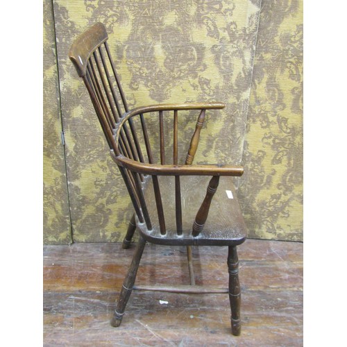 1368 - An early Georgian Windsor stick back chair in ash wood