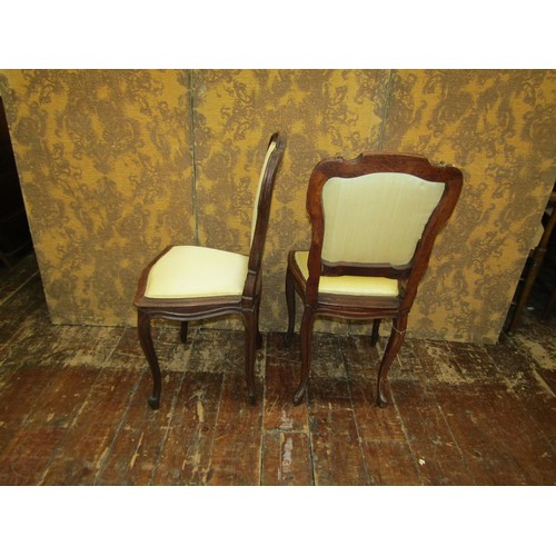 1371 - A set of six late 19th century continental oak framed dining chairs on shaped supports with upholste... 