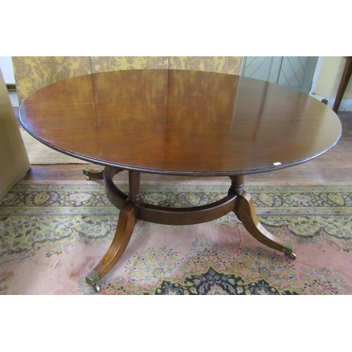 1374 - A good quality Regency style mahogany extending dining table on four turned support, the circular to... 