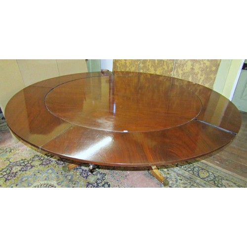 1374 - A good quality Regency style mahogany extending dining table on four turned support, the circular to... 