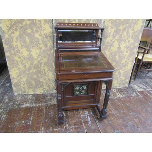 1387 - A Victorian mahogany Davenport in the aesthetic style with painted floral and bird detail, further g... 