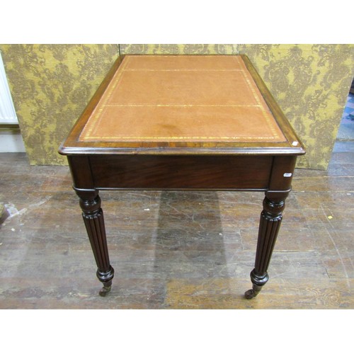 1413 - A 19th century mahogany writing desk by M Willson, 68 Great Queen Street, enclosing two drawers on f... 