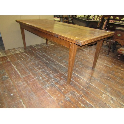 1418 - An oak draw leaf refectory table in the Georgian style, 215cm long when closed (305cm when open) x 9... 