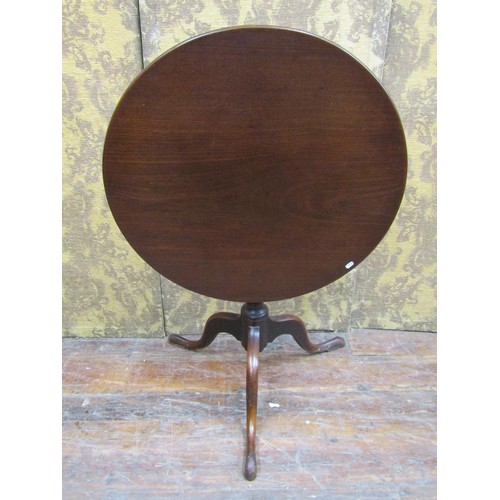 1428 - A Georgian mahogany snap top table on gun barrel pillar and tripod base, 71cm diameter