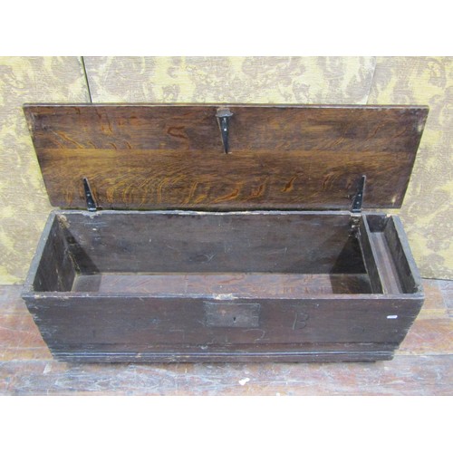 1433 - An oak boarded coffer monogrammed W B 1729, with steel lock plate and hasp, 103cm long