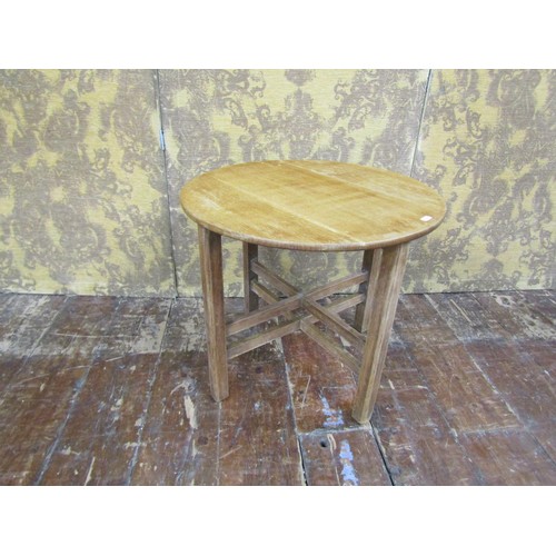 1435 - A circular oak occasional table in the Heals manner, 53cm diameter