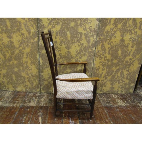 1439 - An arts and crafts armchair in beechwood with upholstered seat