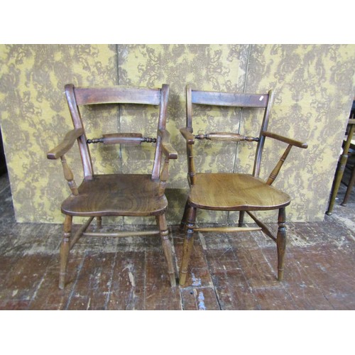 1442 - A matched pair of 19th century Windsor Oxford pattern elbow chairs in elm and ash