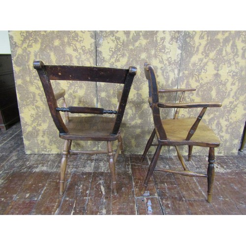 1442 - A matched pair of 19th century Windsor Oxford pattern elbow chairs in elm and ash