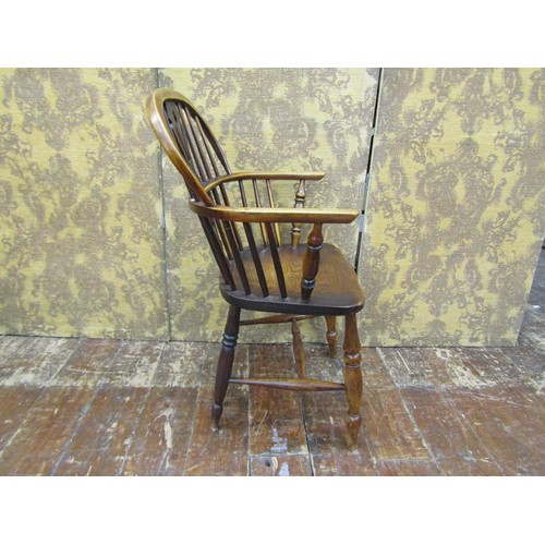 1447 - A Georgian Windsor elm and ashwood elbow chair, with pierced splat