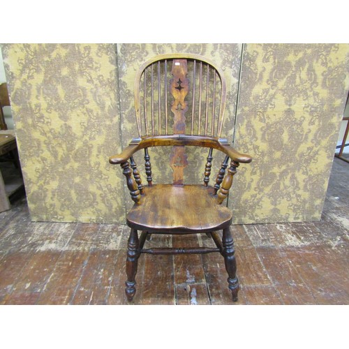 1449 - A large Windsor elbow chair elm and ash and other mixed woods