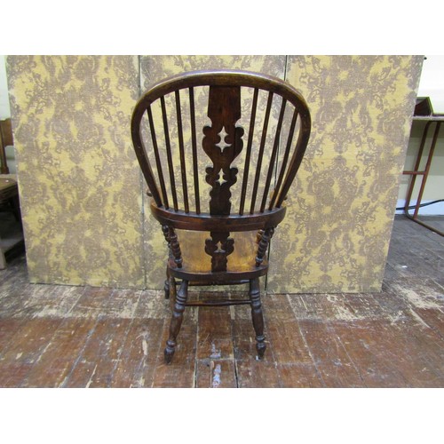 1449 - A large Windsor elbow chair elm and ash and other mixed woods