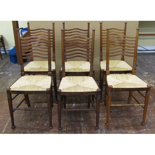 1457 - A set of eight (6+2) Arts & Crafts dining chairs by William Birch in oak, with pierced wavy splat la... 