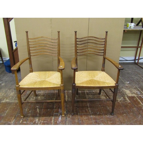 1457 - A set of eight (6+2) Arts & Crafts dining chairs by William Birch in oak, with pierced wavy splat la... 