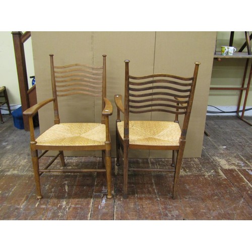 1457 - A set of eight (6+2) Arts & Crafts dining chairs by William Birch in oak, with pierced wavy splat la... 