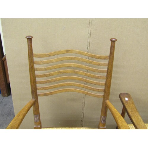 1457 - A set of eight (6+2) Arts & Crafts dining chairs by William Birch in oak, with pierced wavy splat la... 