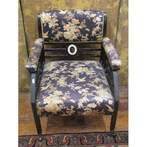 1468 - A 19th century ebonised armchair in the Aesthetic manner with upholstered finish.

Ivory Submission ... 