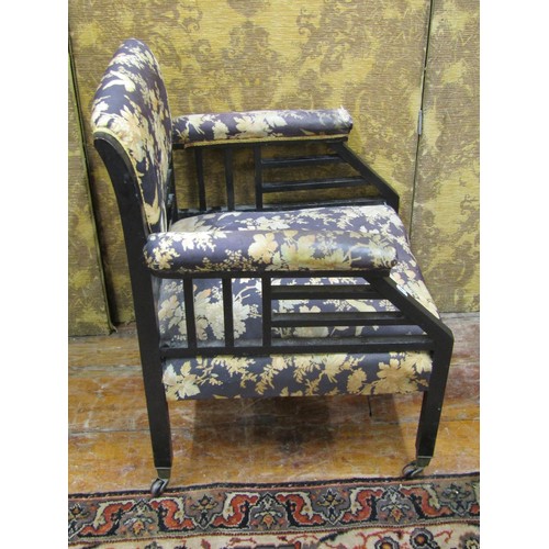 1468 - A 19th century ebonised armchair in the Aesthetic manner with upholstered finish.

Ivory Submission ... 