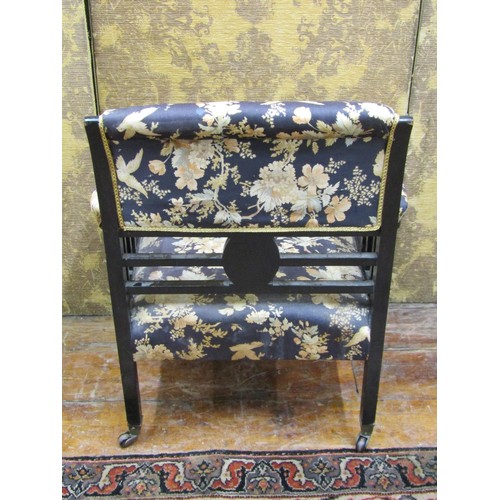 1468 - A 19th century ebonised armchair in the Aesthetic manner with upholstered finish.

Ivory Submission ... 