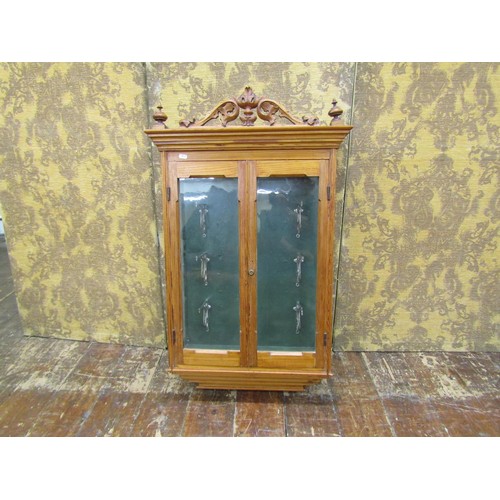 1470 - A Victorian pitch pine wall hanging display cabinet with glazed panels, chrome fittings and set bene... 