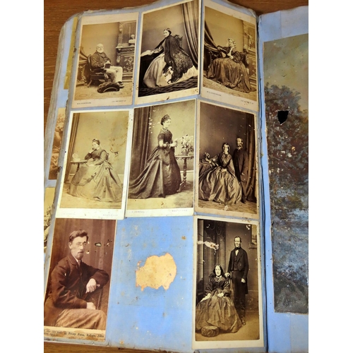 609 - A large (33 x 21cm) Victorian scrap album from the 1870/80s containing photographs (some studio, oth... 