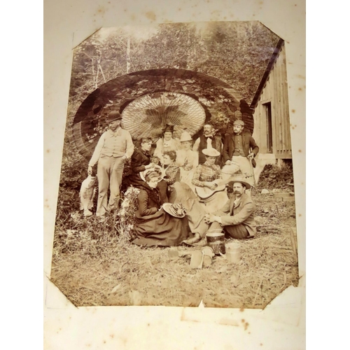 610 - A large (37 x 27cm) 19th century photograph album featuring images from Vancouver and Honolulu as we... 