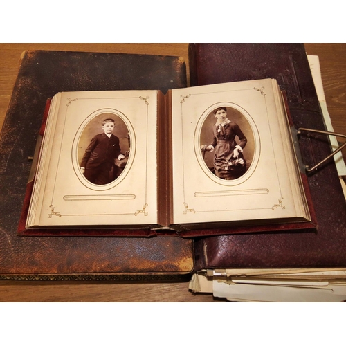 611 - Three Victorian photograph albums containing mostly portraiture but also family groups and interesti... 