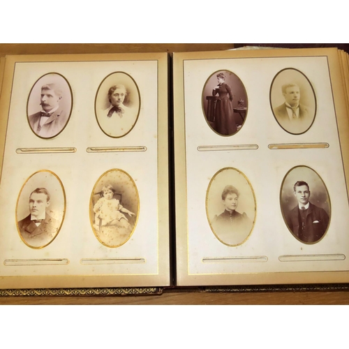 611 - Three Victorian photograph albums containing mostly portraiture but also family groups and interesti... 