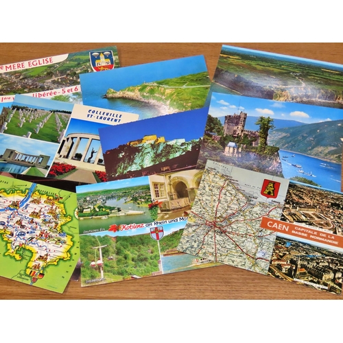 615 - A large collection of mixed postcards and photographs - transport, travel and saucy humorous