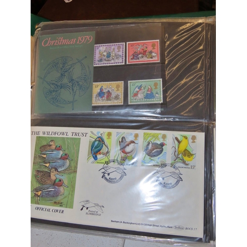 624 - A large collection of First Day Covers and Mint British stamps together with a green folder (New Tha... 