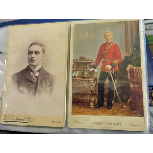 627 - Ten albums of Victorian postcard size portrait photographs together with an album of postcards (inco... 