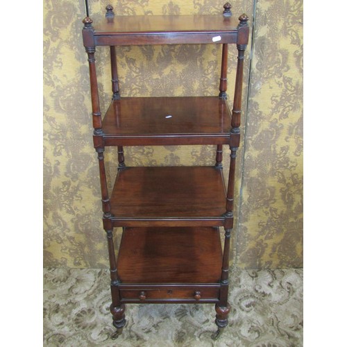 1385 - A early 19th century mahogany four tier watnot of square cut form enclosing a shallow lower frieze d... 