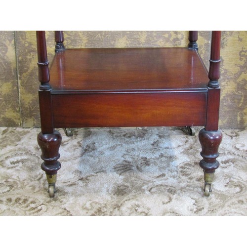 1385 - A early 19th century mahogany four tier watnot of square cut form enclosing a shallow lower frieze d... 