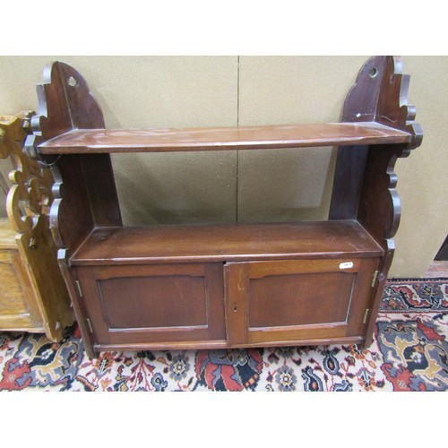 1451 - A 19th century oak wall mounted bookshelf partially enclosed and a further mahogany example