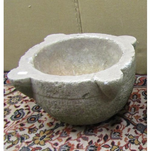 1409 - An antique stone mortar, 45cm diameter max