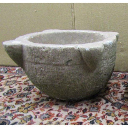 1409 - An antique stone mortar, 45cm diameter max