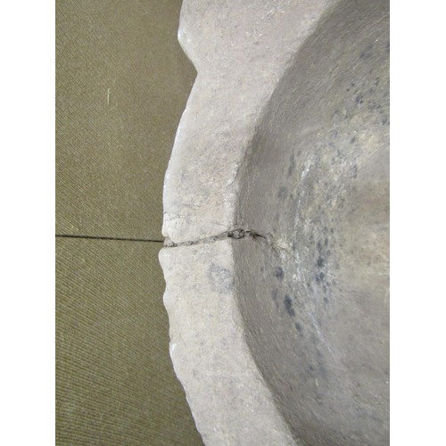 1410 - An antique stone mortar, 50cm max diameter