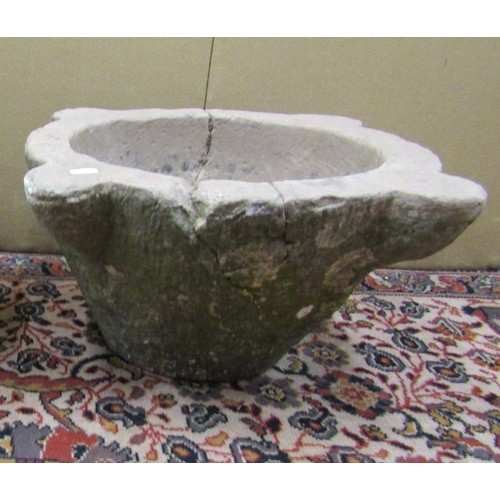 1410 - An antique stone mortar, 50cm max diameter